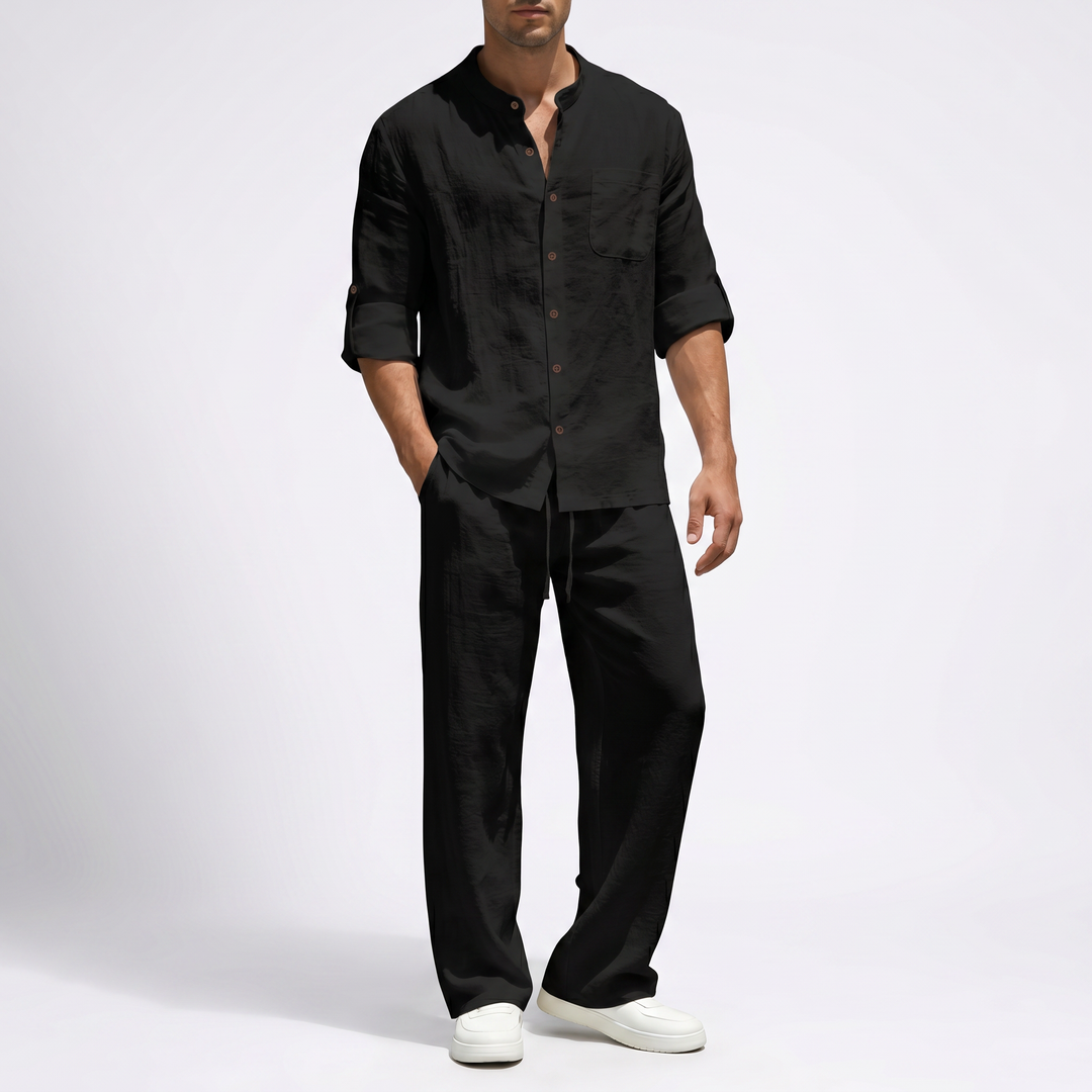Relaxed fit men's linen two-piece set with mandarin collar shirt & comfortable drawstring pants.
