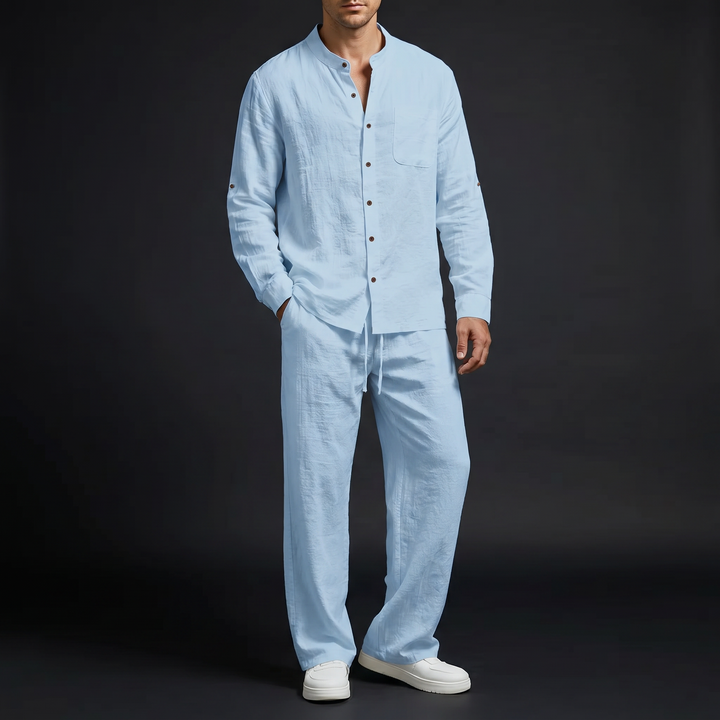 Comfortable men's linen two-piece set; mandarin collar shirt & relaxed fit drawstring pants.