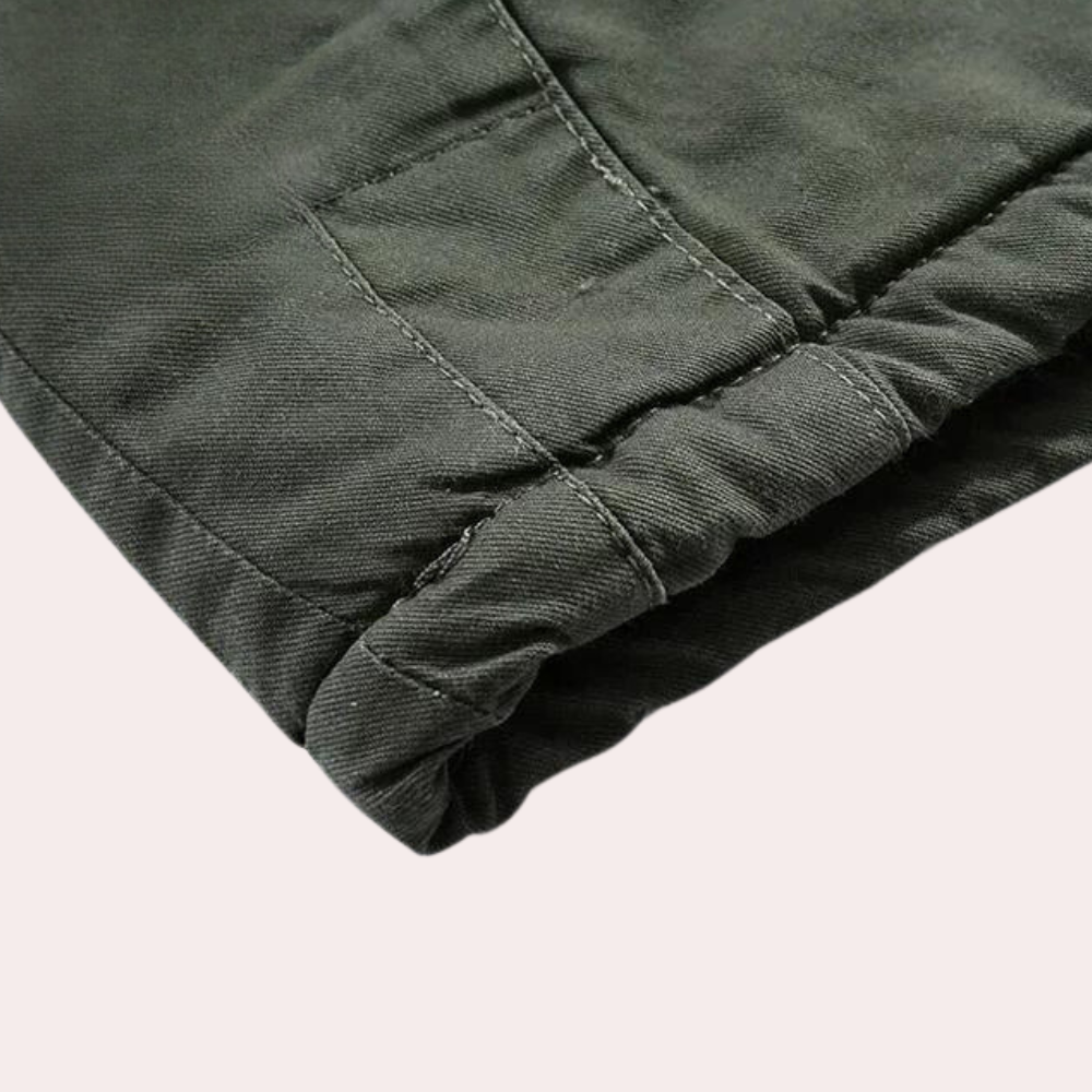 Stylish men's Logan winter jacket, a padded outdoor coat with a warm hood for ultimate cold weather comfort.