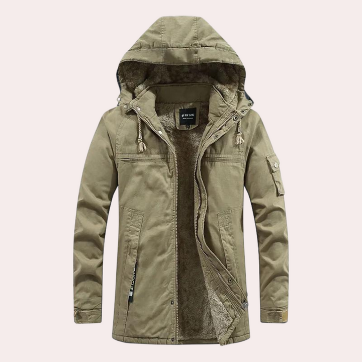 Men's Logan winter jacket, a comfort fit padded coat with a warm hood, designed for extreme cold weather.