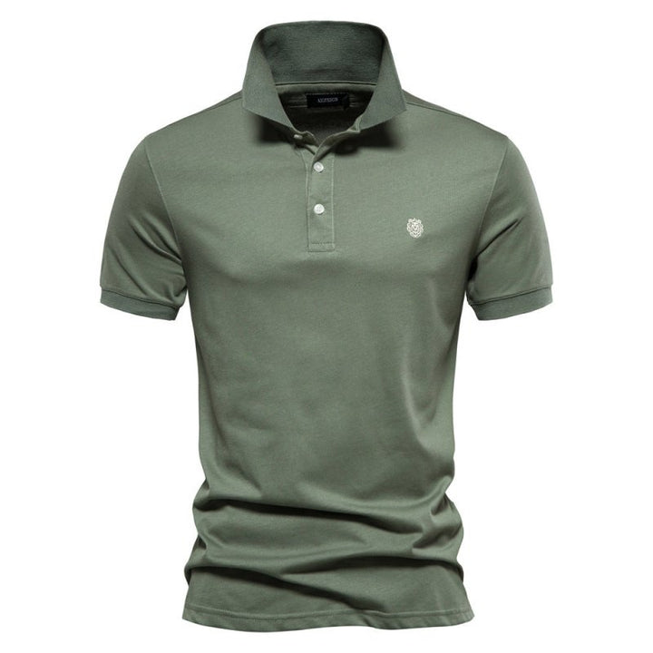 Detail of the collar & button placket on the Men's Logan Polo Shirt for a refined look.