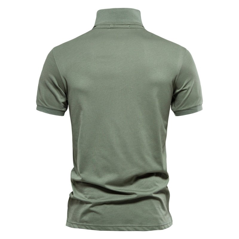 Man wearing the Men's Logan Polo Shirt, demonstrating its smart casual fit & comfortable feel.