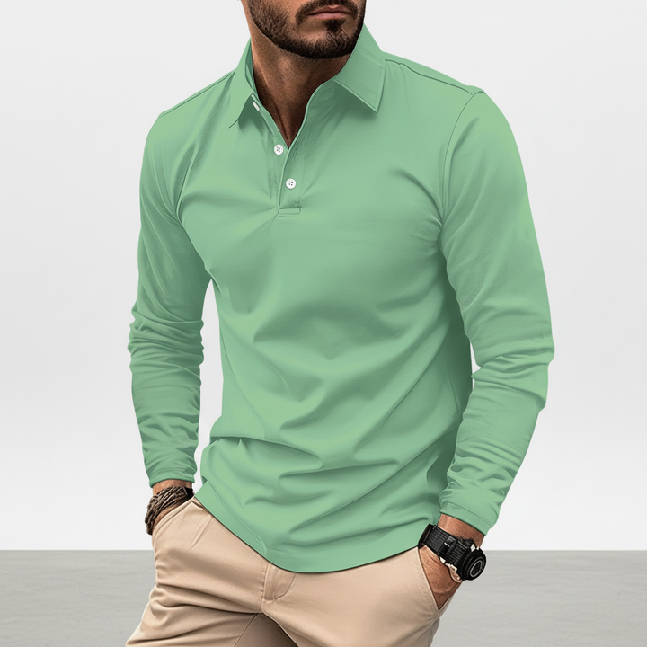 Breathable cotton blend men's long sleeve polo, perfect for a smart-casual look.