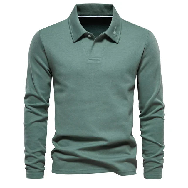 Everyday comfort meets smart wear in this men's long-sleeve turn-down collar polo shirt.