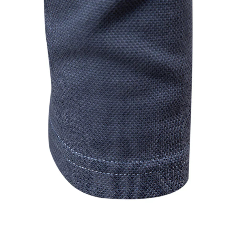 Versatile men's apparel: long-sleeve turn-down collar polo shirt, great for smart or casual looks.