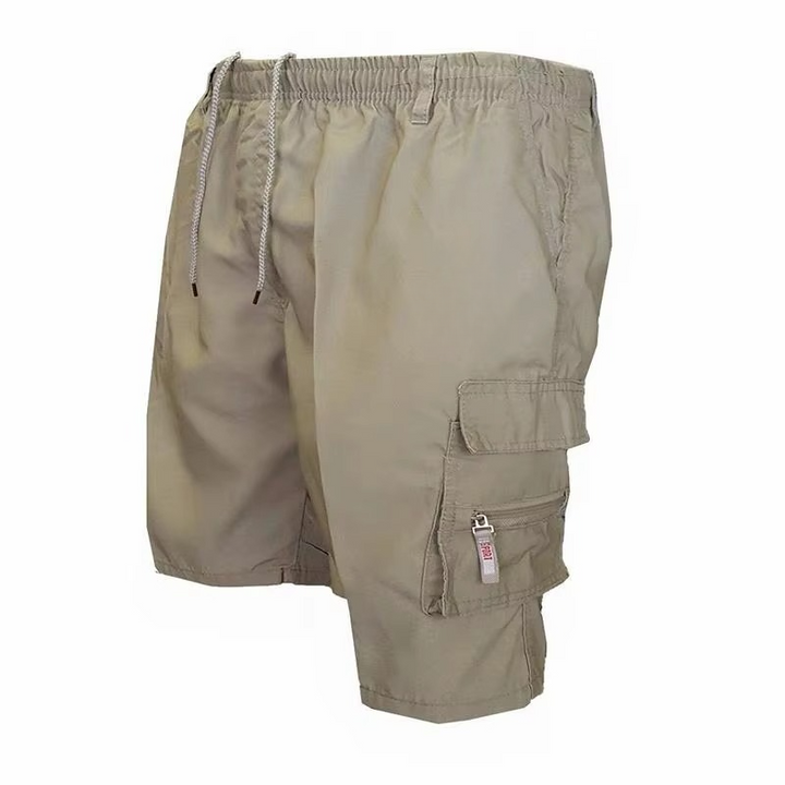 Comfortable men's cargo shorts, loose fit, knee-length, multiple pockets for outdoor & utility wear.
