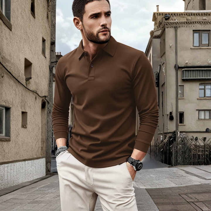 Solid color loose fit long sleeve polo for men, offering classic casual style and everyday comfort.