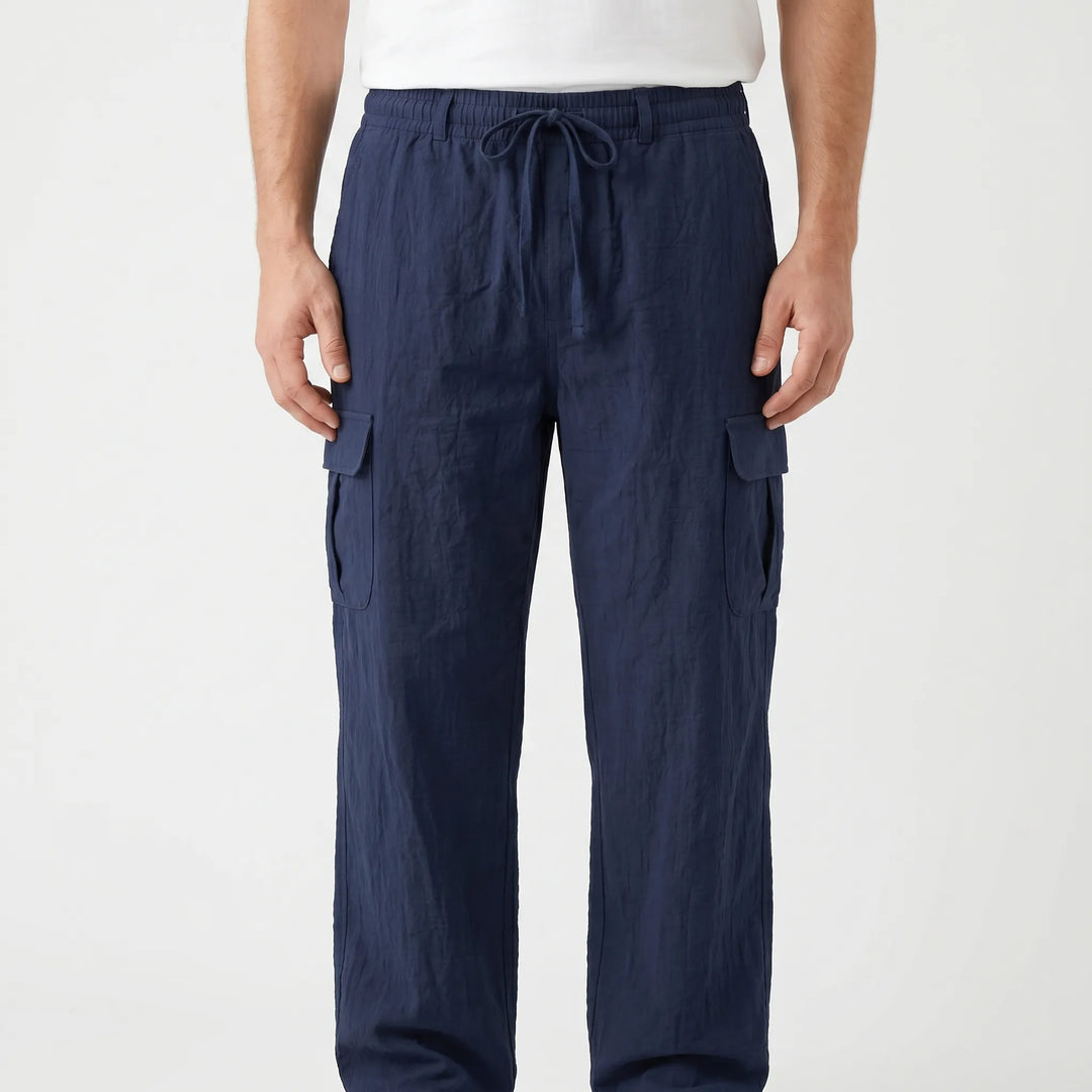 Relaxed fit men's cargo pants with utility pockets & drawstring waist for ultimate comfort & function.