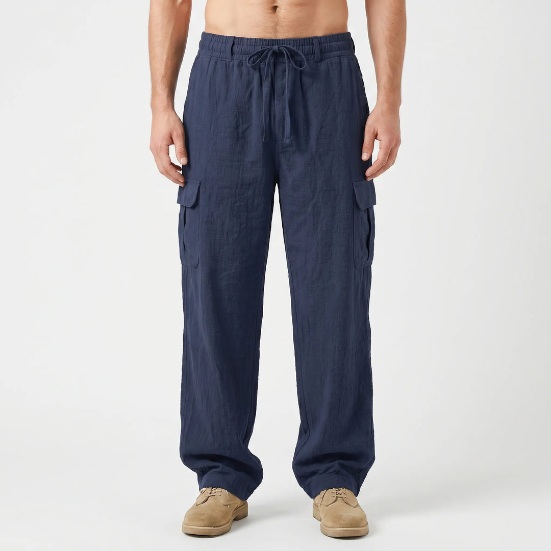 Oversized men's cargo pants featuring multiple utility pockets & a relaxed straight leg for modern style.