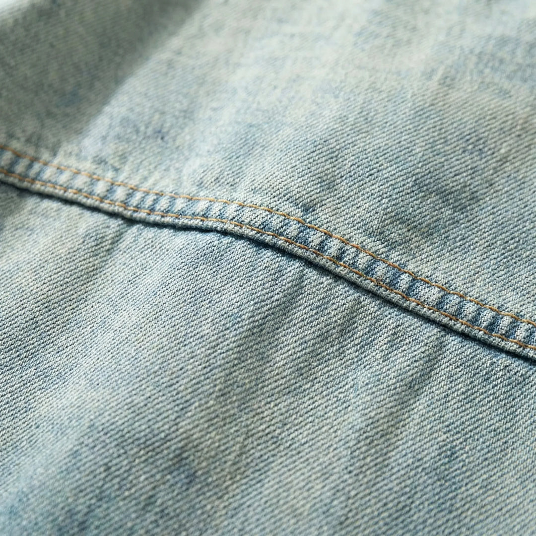 Trendy men's denim zip-up jacket with a loose fit, great for modern streetwear fashion.
