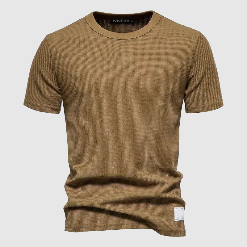 Folded Men's Lorenzo Breeze Tee, a lightweight and comfortable casual wear t-shirt ready for your summer wardrobe.