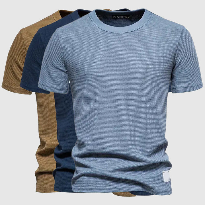 Back view of the Men's Lorenzo Breeze Tee, highlighting its relaxed fit and breathable design for casual comfort.