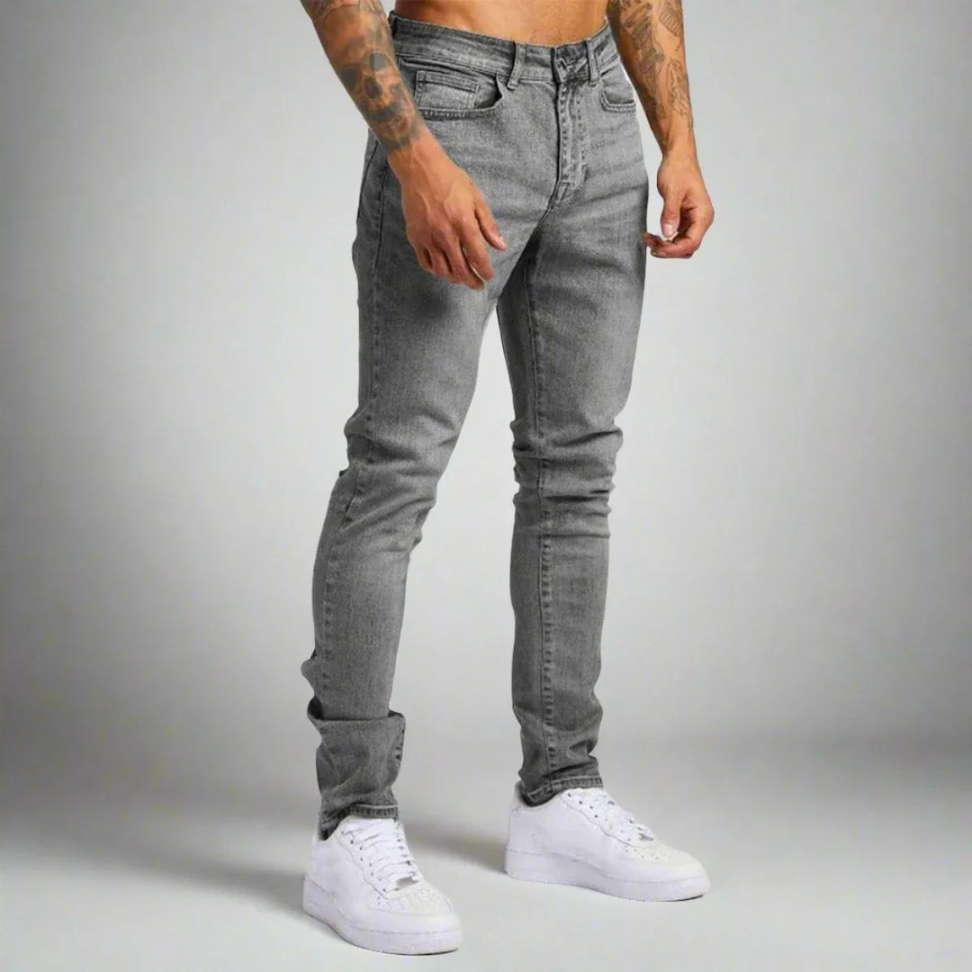 Man wearing comfortable Lorenzo stretch denim jeans, paired for a stylish everyday casual look.