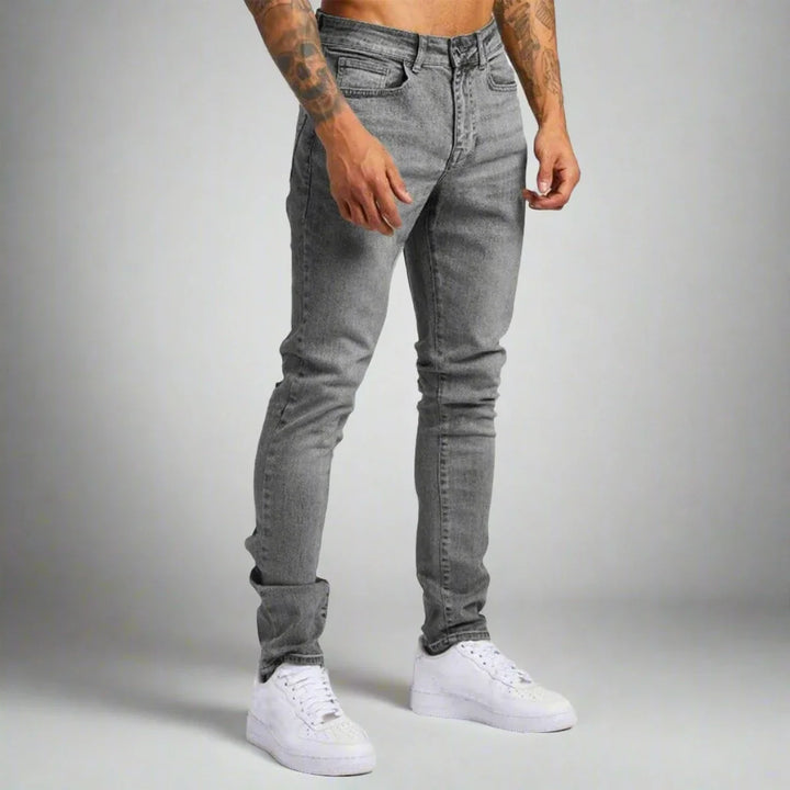 Man wearing comfortable Lorenzo stretch denim jeans, paired for a stylish everyday casual look.