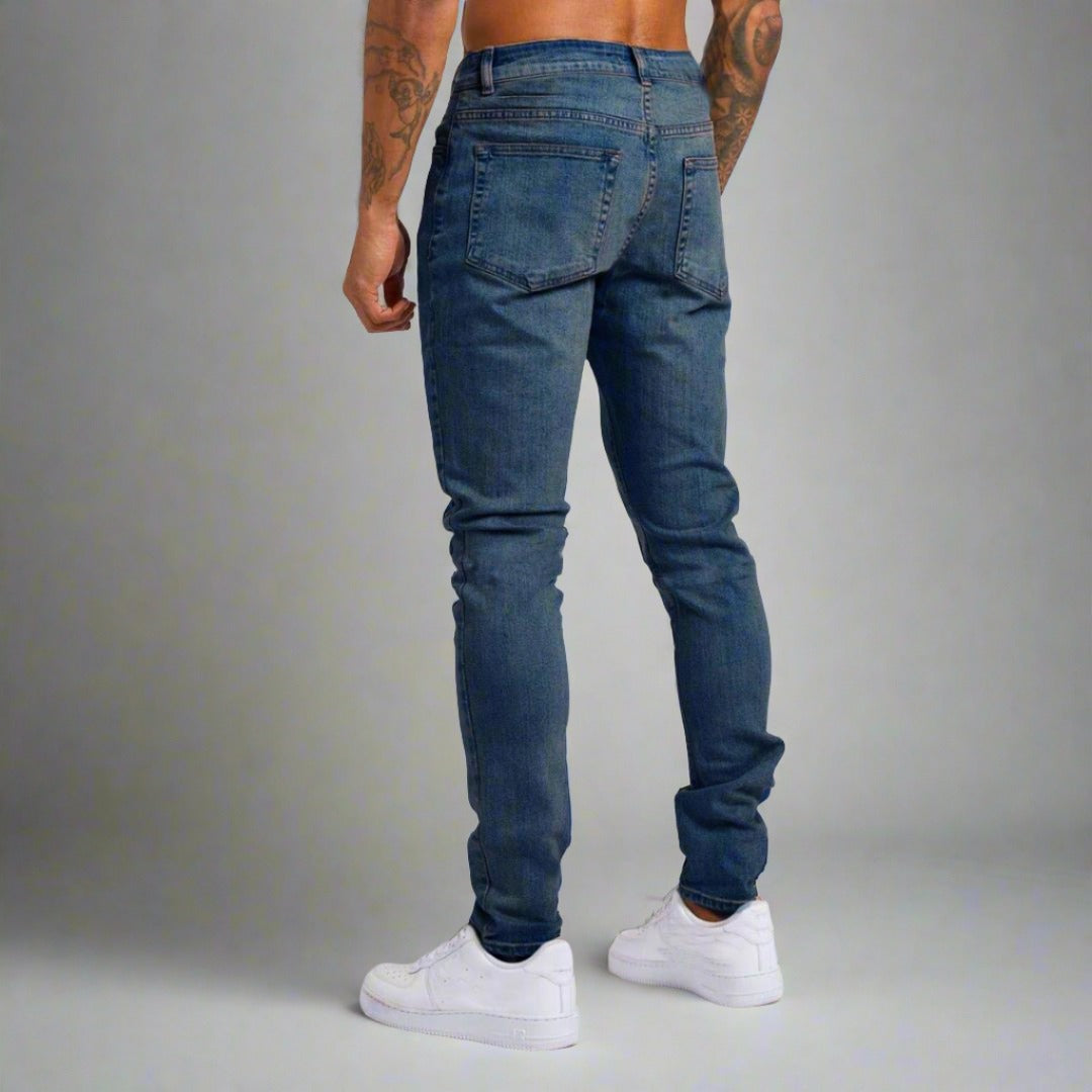 Detail of Lorenzo men's jeans stitching & pocket, showcasing quality denim & stylish design.
