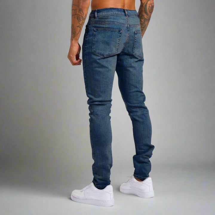 Detail of Lorenzo men's jeans stitching & pocket, showcasing quality denim & stylish design.