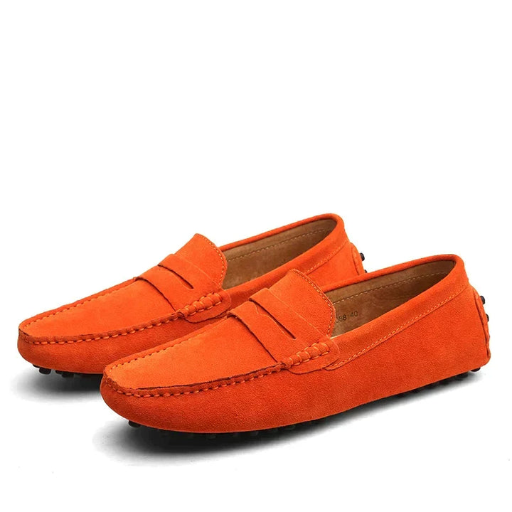 Stylish and comfortable men's Italian loafers in soft suede, perfect slip-on footwear for an effortless look.