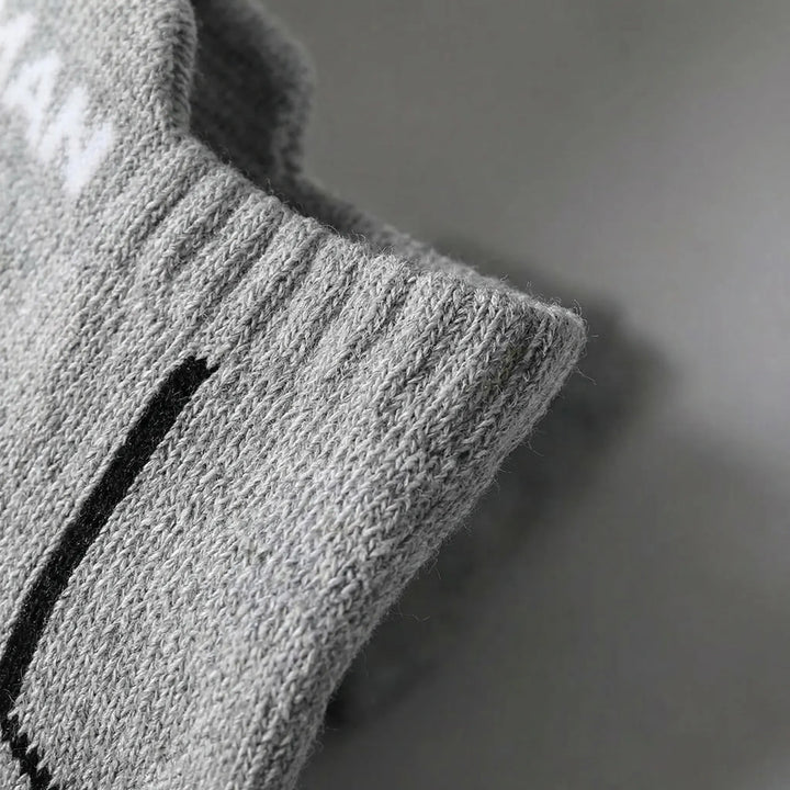 Breathable men's low-cut ankle socks with cushioning, ideal for sports & activewear, 6-pair pack.
