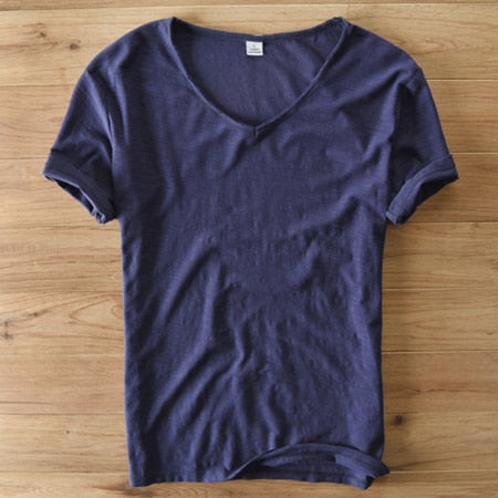 White V-neck linen blend shirt for men, an essential item for everyday summer wear