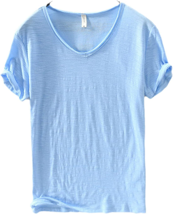 Man wearing a white V-neck linen blend shirt, short sleeve, casual and comfortable for everyday