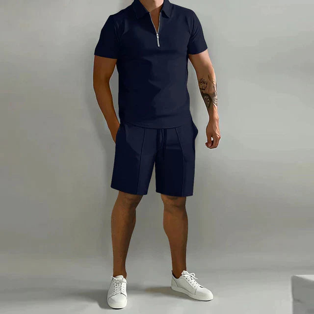 Stylish men's vacation outfit: Luxe summer polo and matching shorts. Ideal for casual holiday comfort.