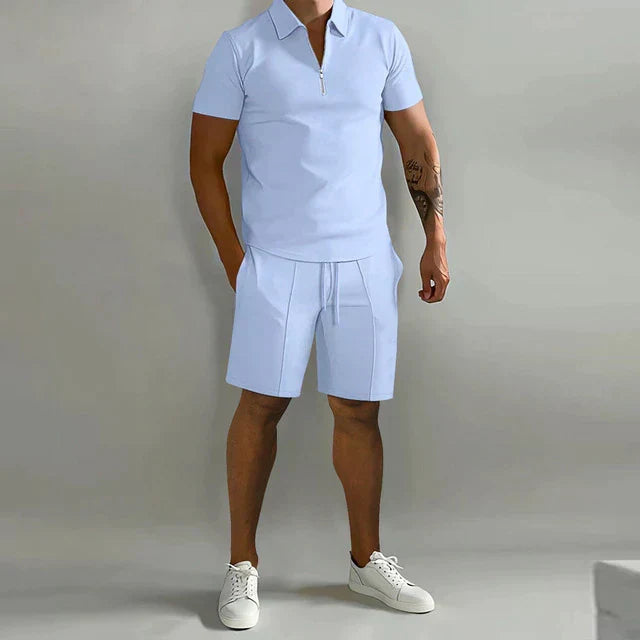 Luxe Men's Summer Outfit: Coordinated polo and shorts set for ultimate style and breathability on vacation.