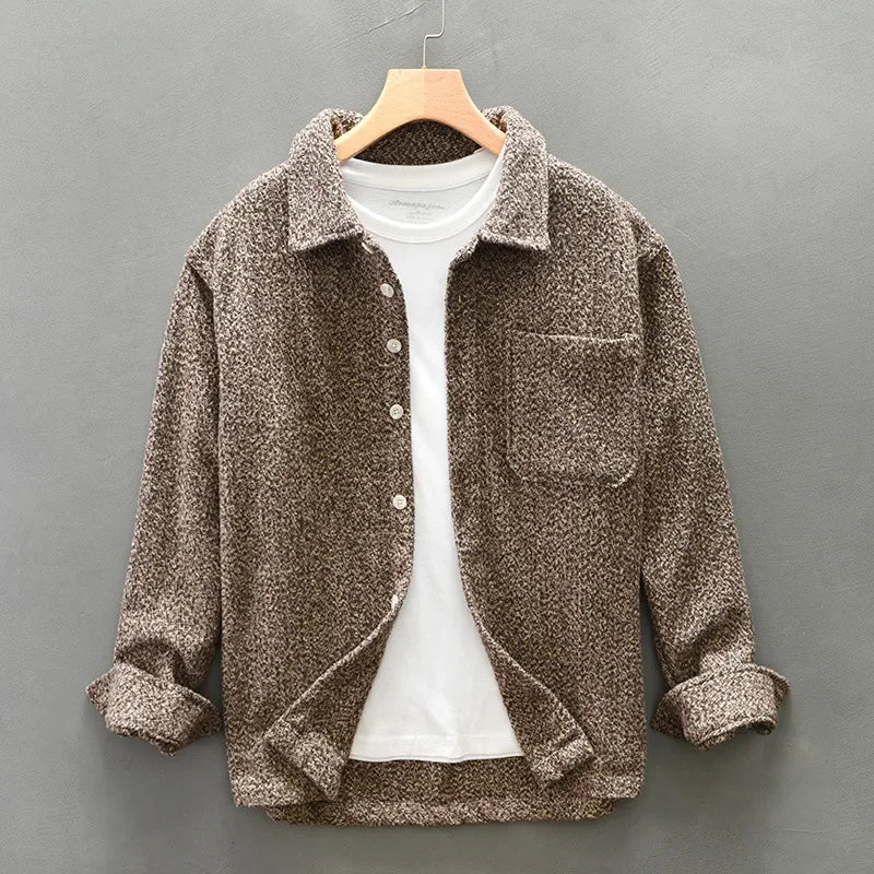 Men's luxurious boucle-knit overshirt. Soft textured fabric, elegant long-sleeve button-down, versatile smart casual layer.