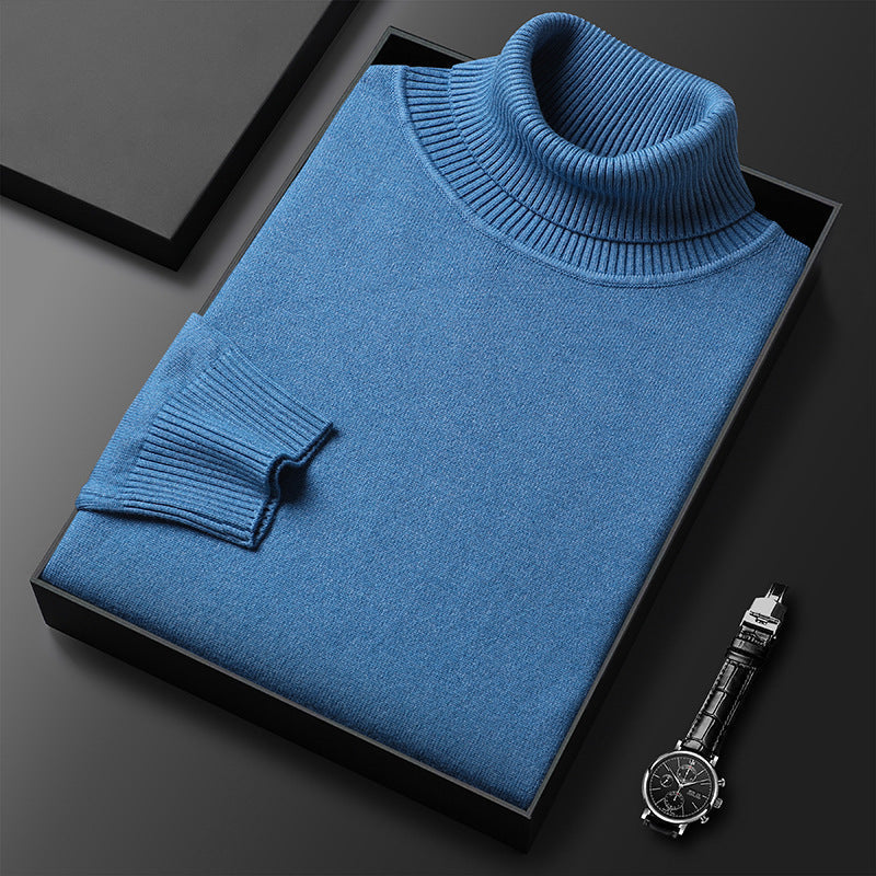 Elegant men's cashmere blend turtleneck sweater modeled, showing comfortable fit and refined style.