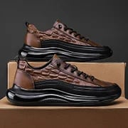 Urban men's luxury air cushion sneakers, combining contemporary street style with superior foot comfort.