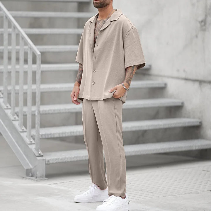 Stylish men's luxury button shirt and pants set, offering a comfortable and elegant two-piece fashion look.