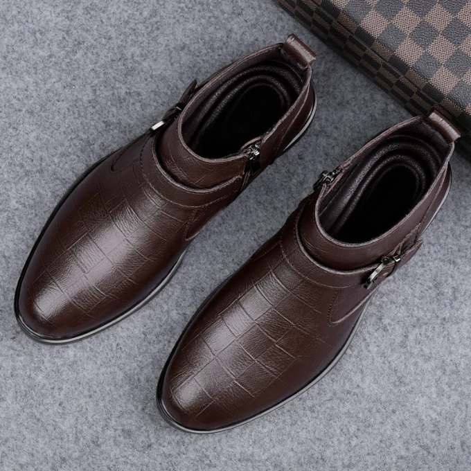 Premium full-grain leather men's ankle boots. Luxurious design, perfect for comfort & style.