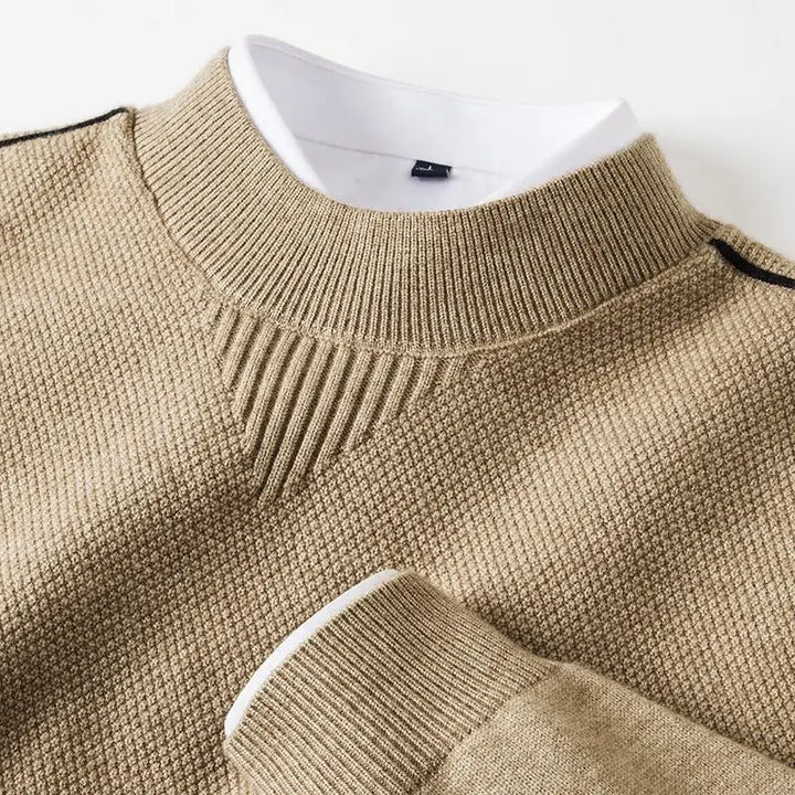 Men's luxury jacquard sweater with mock neck. Sophisticated textured design for elevated winter style.