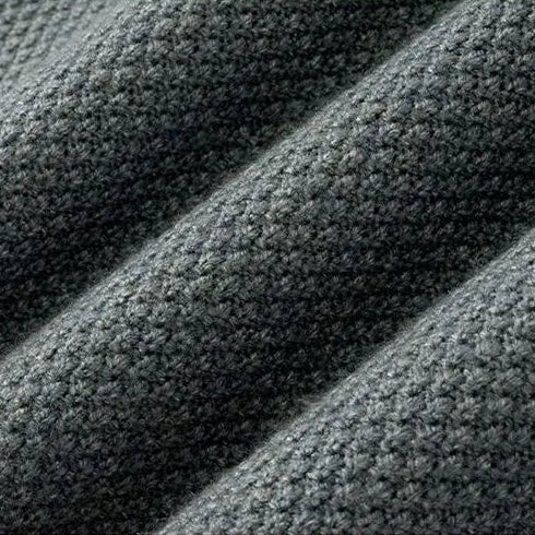 Luxury men's jacquard mock neck sweater. Elevated, sophisticated textured style, perfect for smart casual fashion.