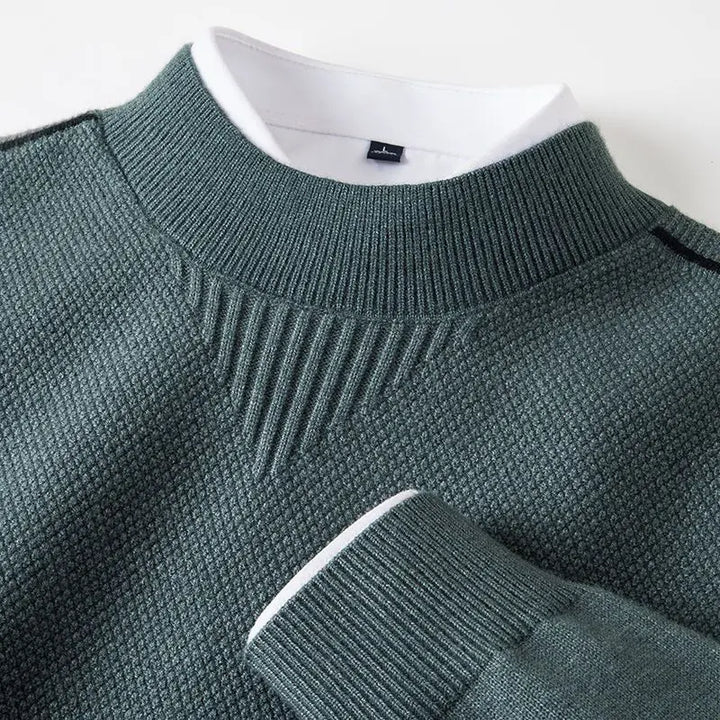 Comfortable men's jacquard mock neck sweater. Intricate textured pattern for luxury winter fashion.
