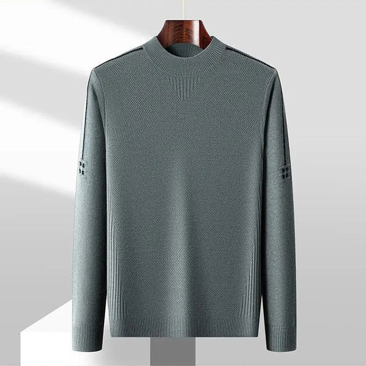 Sophisticated men's mock neck sweater. Luxury jacquard knit with textured style for men's elevated fashion.