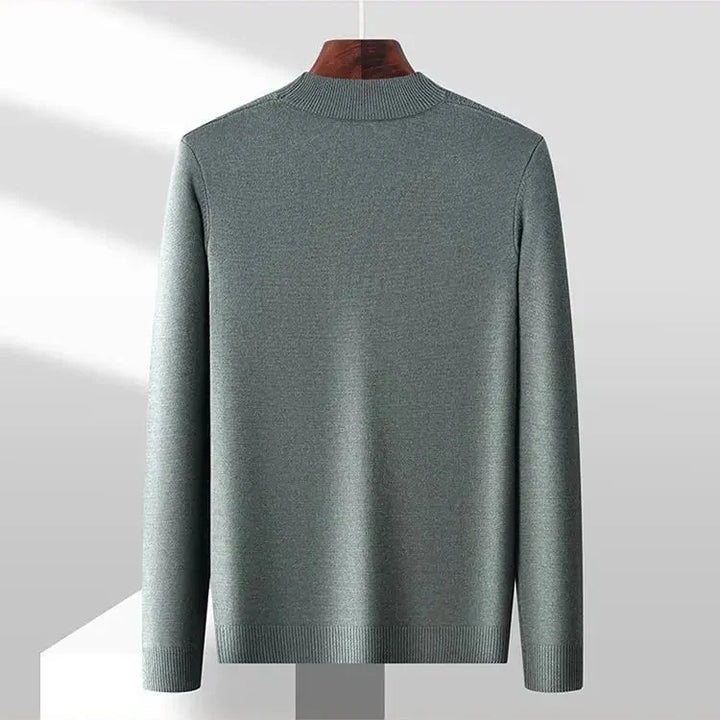 Exclusive men's jacquard sweater. Mock neck, ribbed cuffs & textured style for versatile winter fashion.