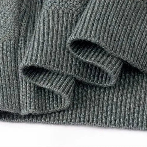 Stylish men's jacquard sweater with mock neck. Elegant textured fabric for a sophisticated, elevated winter look.