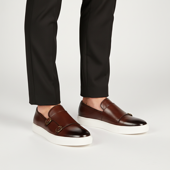Classic black leather dress shoes for men, featuring a sophisticated buckle, ideal for formal occasions