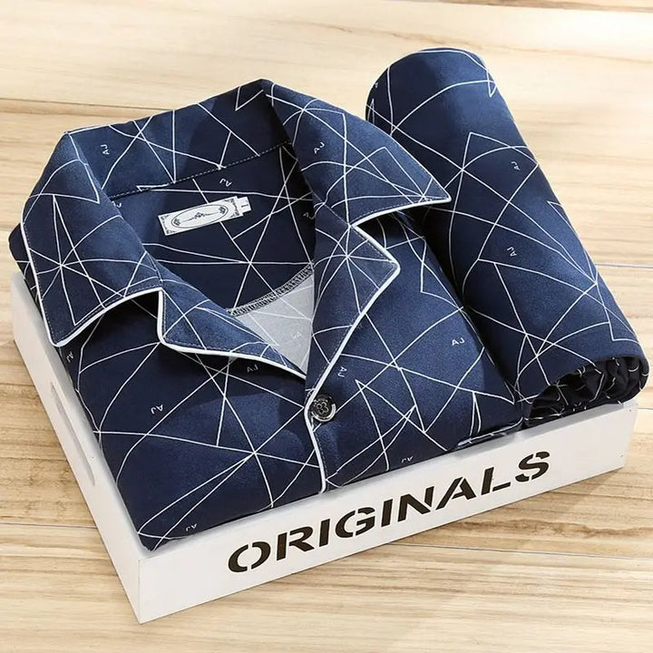 Men's luxury soft pajama set featuring breathable fabric & button-up design. Essential loungewear for men.