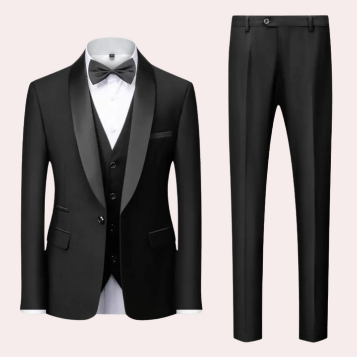 Men's luxury three-piece suit, tailored fit for formal events & weddings. Elegant black/dark gray menswear.
