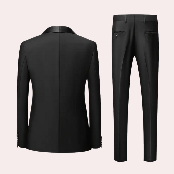 Stylish men's three-piece wedding suit. Tailored formal attire for grooms & guests, in black or dark gray.