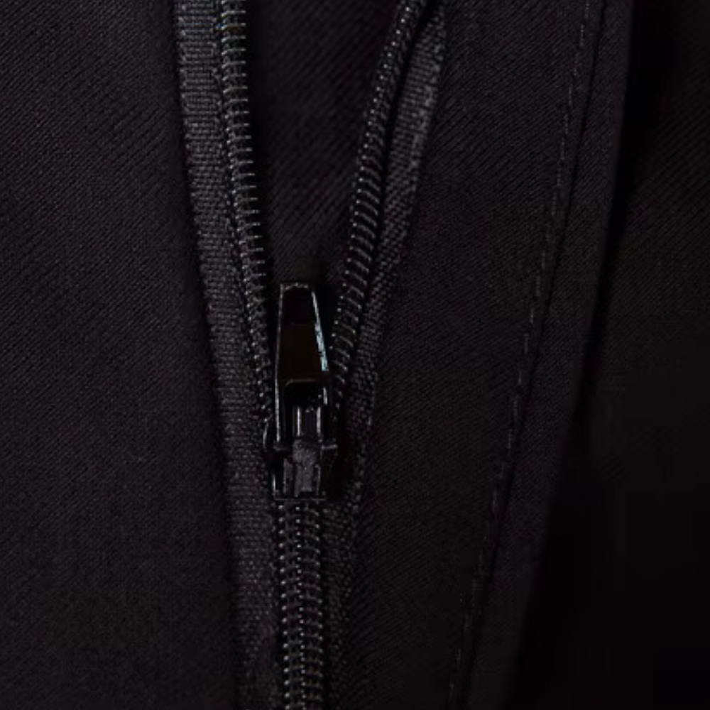 Modern tailored fit men's three-piece suit. Luxury formal fashion for weddings, business & elegant events.