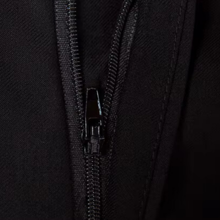 Modern tailored fit men's three-piece suit. Luxury formal fashion for weddings, business & elegant events.