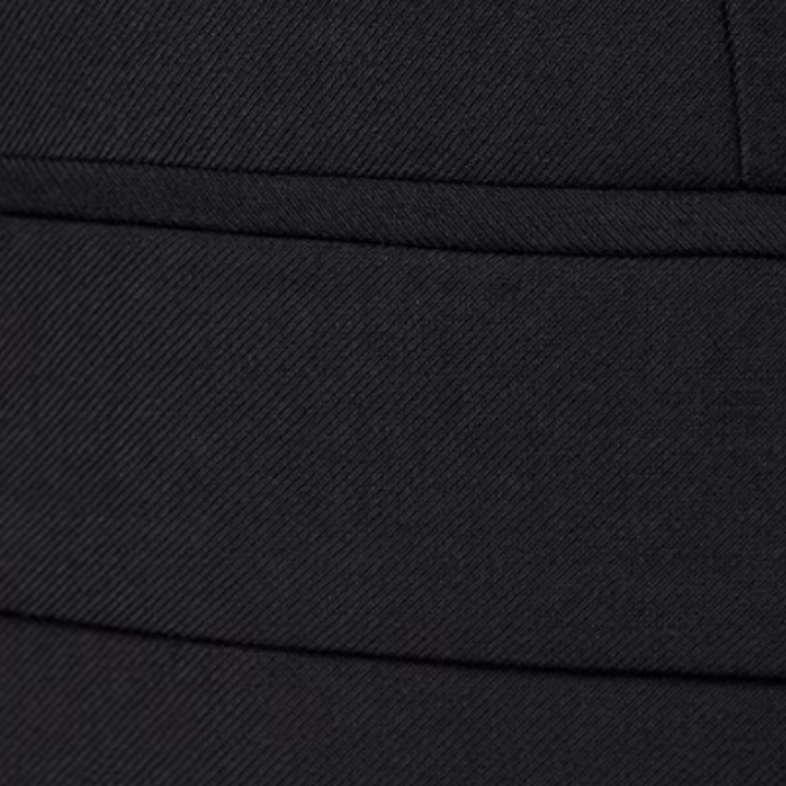 Classic black men's three-piece suit. Tailored formal wear, luxury wedding attire, business elegant.