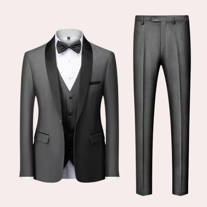 Complete men's three-piece formal suit: tailored jacket, vest, & trousers. Elegant for weddings & special events.