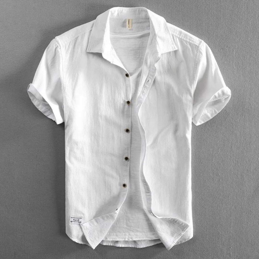 Man in a comfortable men's Madrid long sleeve shirt, an essential for classic, versatile casual style.
