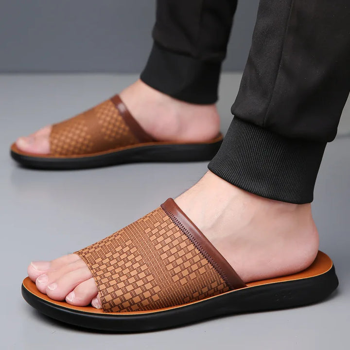 Stylish men's Marbella open-toe slide sandals, ideal for vacation & beach.