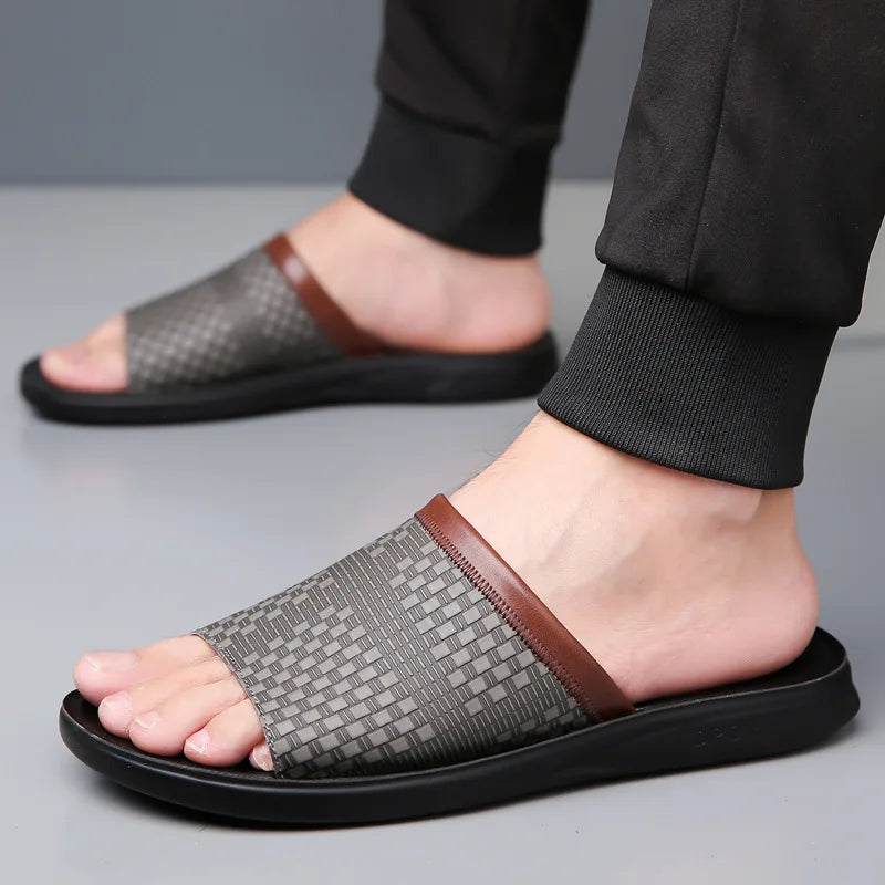 Durable men's Marbella slide sandals, perfect for beach and poolside.