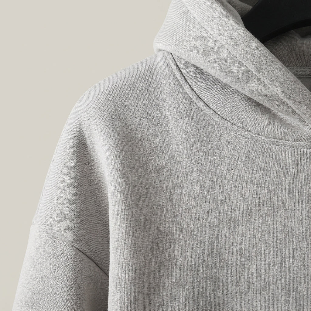 Close-up of the fabric texture of a men's warm leisure suit, showcasing the soft cotton blend.
