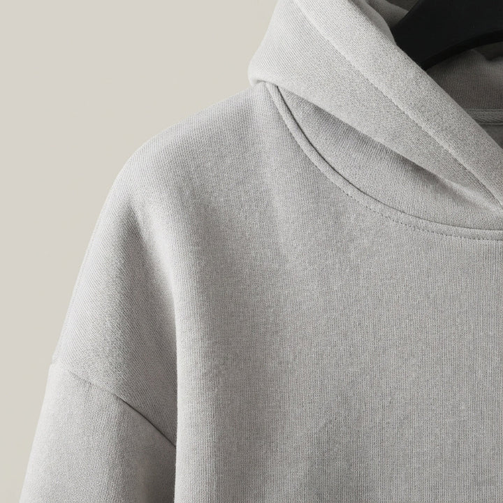 Close-up of the fabric texture of a men's warm leisure suit, showcasing the soft cotton blend.